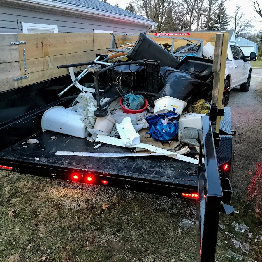 Roll-off dumpster delivered to a residential driveway in Belle Plaine